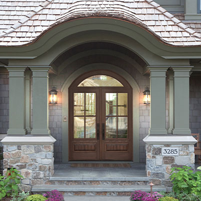 entry door style 181 brown on green stone house